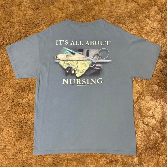 Vintage 90s Its All About Nursing T-Shirt Blue Large - Picture 1 of 5